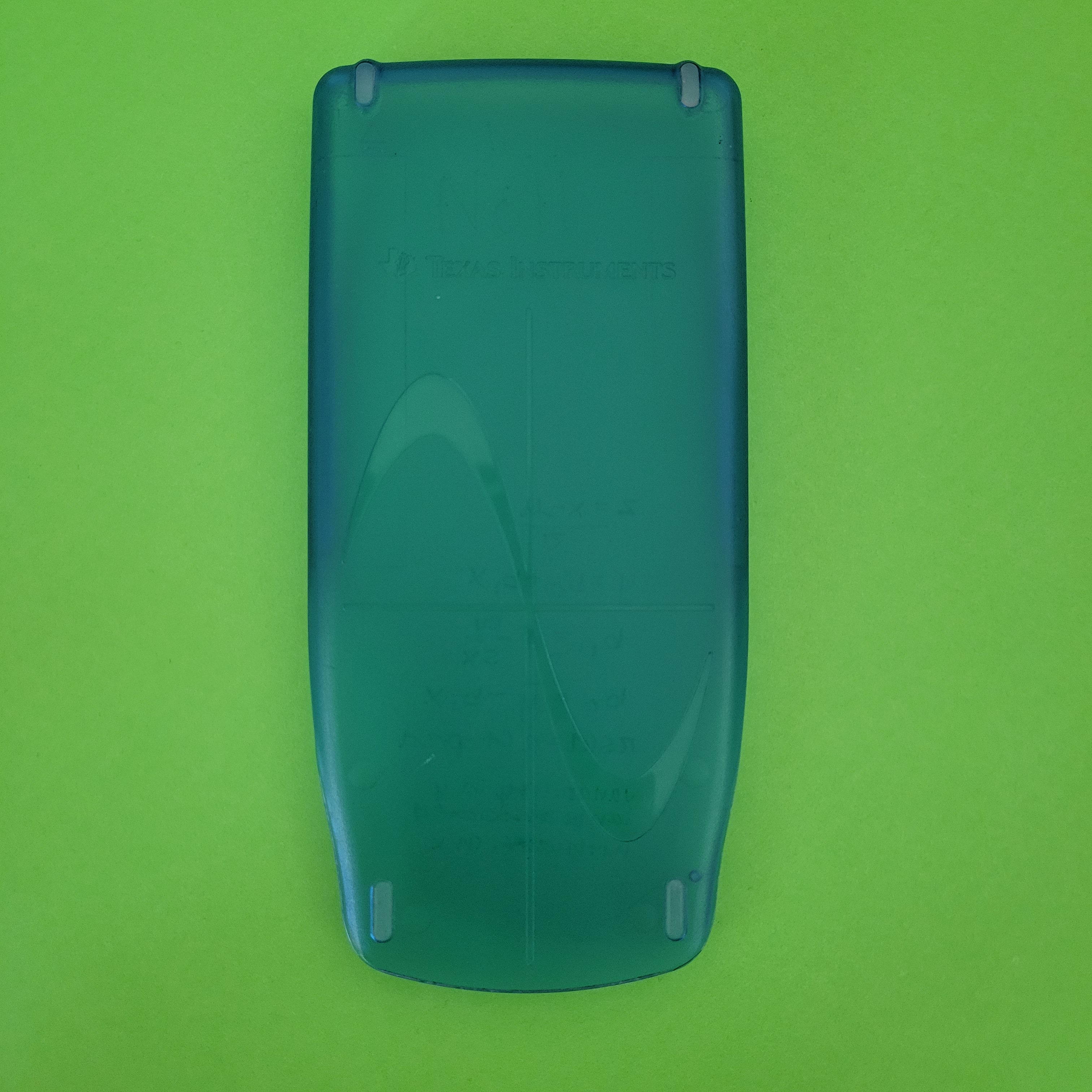 An image of the case of a texas instruments ti83 plus blue graphing calculator